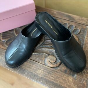 Intentionally blank Shift mules size 8.